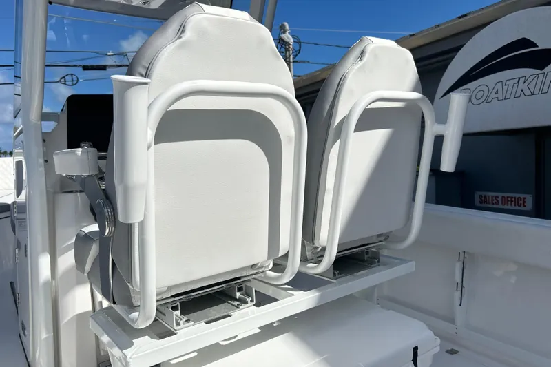  Yacht Photos Pics 2026 Sea Fox 268 Commander boat seats, white upholstery, outdoor setting.