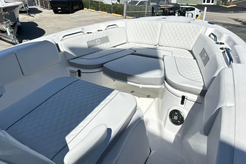 Yacht Photos Pics 2026 Sea Fox 268 Commander boat interior with white cushioned seating.