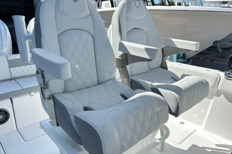  Yacht Photos Pics Luxurious seating on 2026 Sea Fox 268 Commander boat, featuring diamond-stitched upholstery.