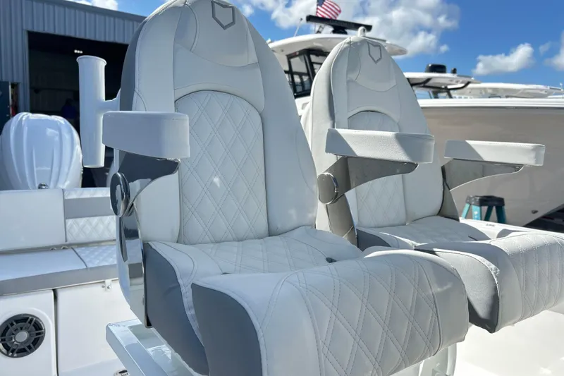  Yacht Photos Pics Luxurious seating on 2026 Sea Fox 268 Commander boat, featuring diamond-stitched upholstery.