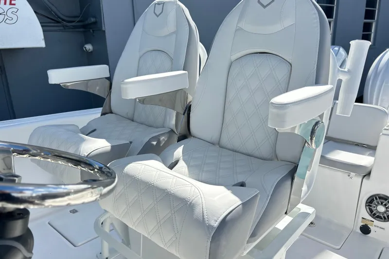  Yacht Photos Pics Luxurious seating on 2026 Sea Fox 268 Commander boat, featuring diamond-stitched upholstery.