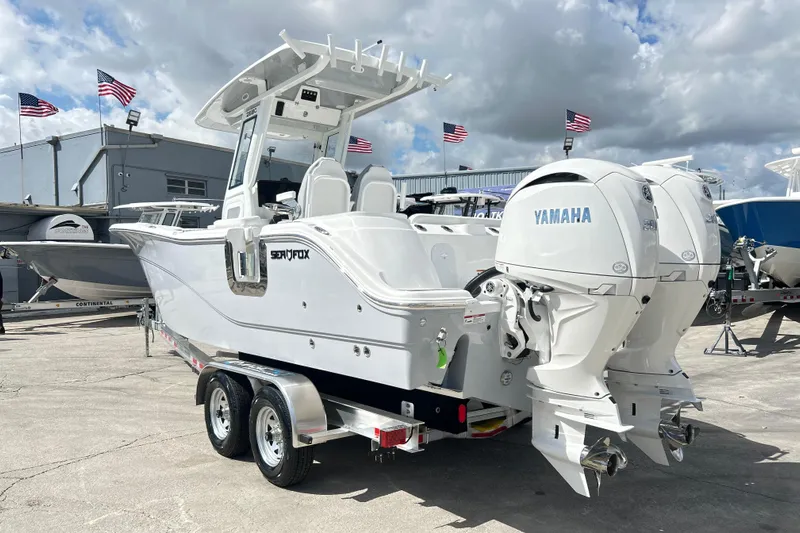  Yacht Photos Pics 2026 Sea Fox 268 Commander boat with dual Yamaha engines on a trailer.