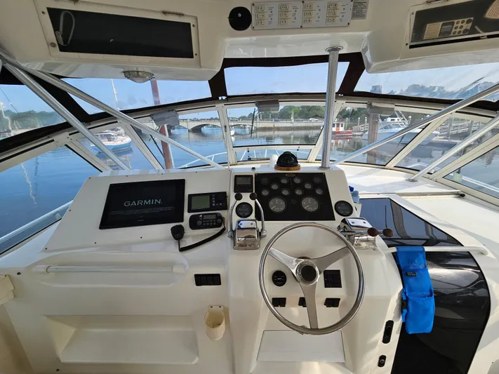 Early Bird Yacht Photos Pics Cockpit of 1998 Ocean Yachts 40 with Garmin navigation, docked at marina.