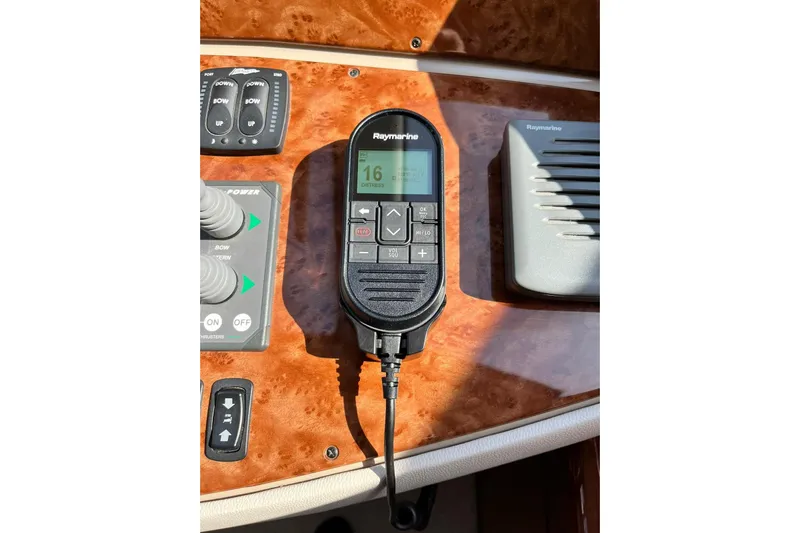  Yacht Photos Pics Control panel of 2008 Marquis 690 Fly with Raymarine marine radio.