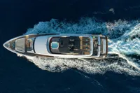 Aerial view of 2020 Custom Line Navetta 33 yacht cruising on the ocean.