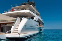 Luxurious 2020 Custom Line Navetta 33 yacht on clear blue ocean water.