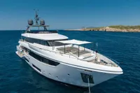 Luxurious 2020 Custom Line Navetta 33 yacht cruising in clear blue waters.