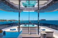 Luxurious 2020 Custom Line Navetta 33 yacht with jacuzzi, ocean view, and elegant deck design.