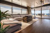 Luxurious interior of 2020 Custom Line Navetta 33 yacht with elegant furnishings and ocean view.