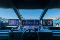 Cockpit view of 2020 Custom Line Navetta 33 yacht with advanced navigation systems.