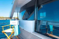 Luxurious 2020 Custom Line Navetta 33 yacht deck with ocean view and seating.