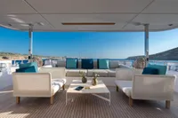 Luxurious outdoor seating on 2020 Custom Line Navetta 33 yacht with ocean view.