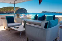 Luxurious 2020 Custom Line Navetta 33 yacht deck with elegant seating and ocean view.