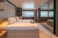 Luxurious bedroom interior of 2020 Custom Line Navetta 33 yacht with modern design.