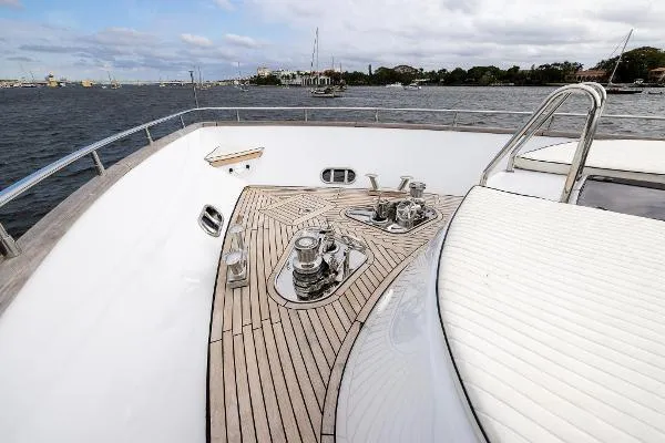  Yacht Photos Pics Luxurious 1999 Azimut yacht deck with sleek wood finish and ocean view.
