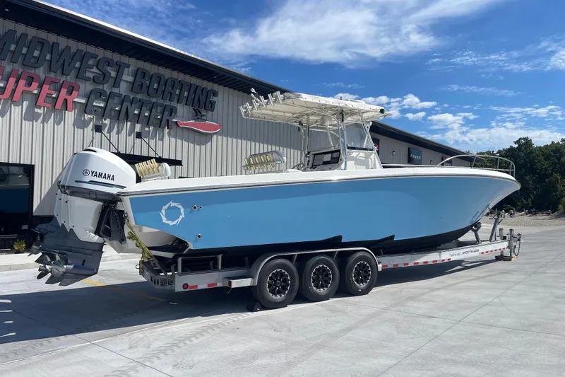  Yacht Photos Pics 2002 Fountain 38 CC Tournament Edition boat on trailer at Midwest Boating Center.