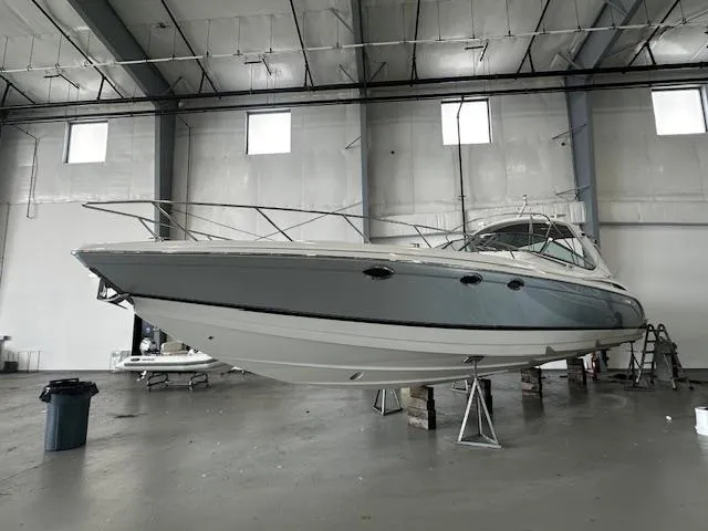  Yacht Photos Pics 2005 Formula 400 SS boat in a spacious indoor storage facility.