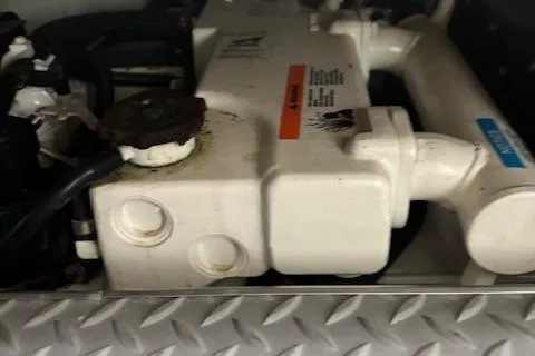  Yacht Photos Pics Engine component of a 2005 Formula 400 SS boat, featuring metal and plastic parts.