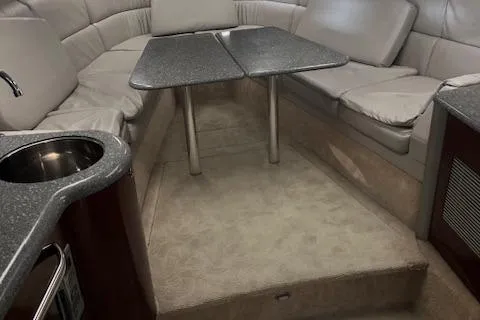  Yacht Photos Pics 2005 Formula 400 SS cabin interior with seating, table, and kitchenette.