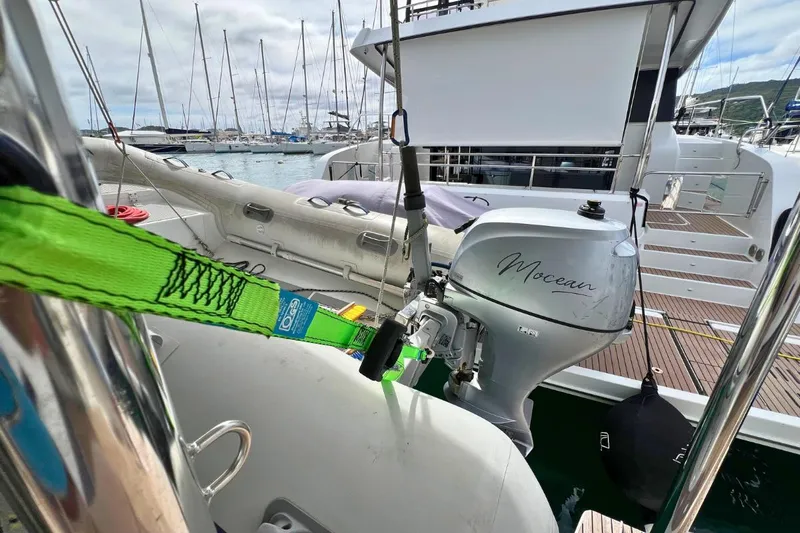 Mocean Yacht Photos Pics 2017 Lagoon 42 yacht with dinghy and outboard motor at marina.