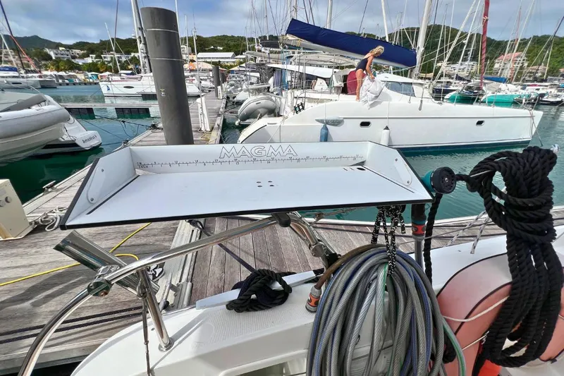 Mocean Yacht Photos Pics Lagoon 42 catamaran at marina with Magma grill and coiled ropes, 2017 model.