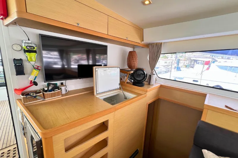 Mocean Yacht Photos Pics Interior of 2017 Lagoon 42 yacht with modern amenities and large window view.