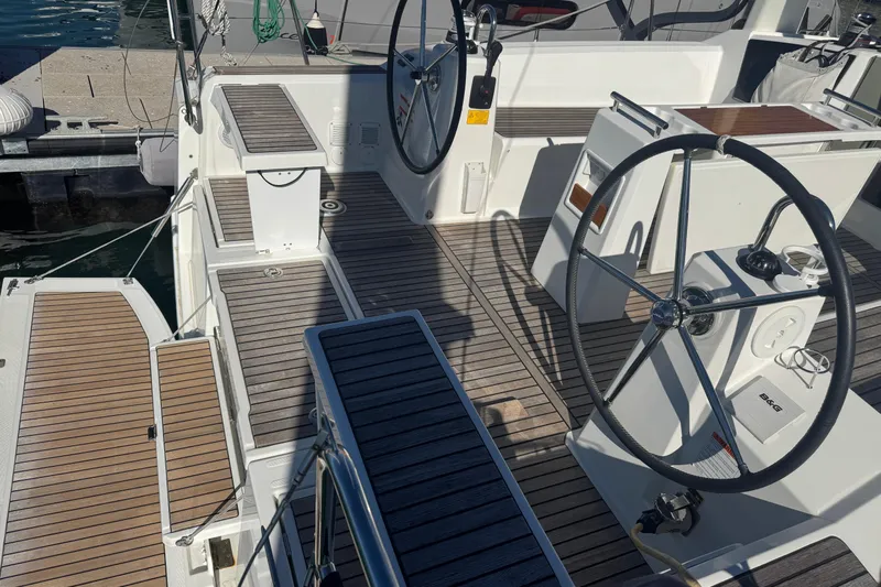  Yacht Photos Pics Cockpit of 2023 Beneteau Oceanis 38.1 sailboat with dual steering wheels.
