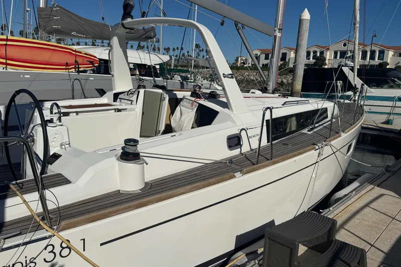  Yacht Photos Pics 2023 Beneteau Oceanis 38.1 sailboat docked at marina, showcasing sleek design.