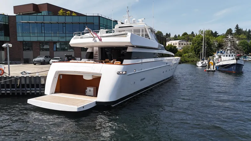 Arrivederci IV Yacht Photos Pics Luxury yacht Cantieri di Pisa AKHIR 1998 docked at marina, sunny day.