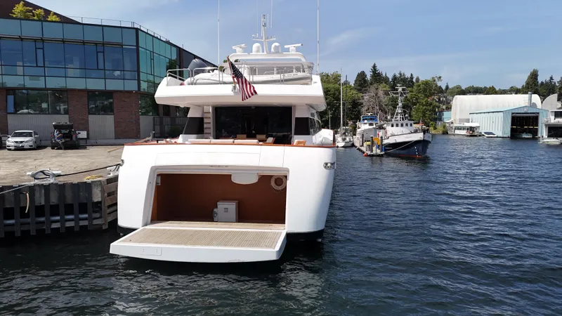 Arrivederci IV Yacht Photos Pics Luxury yacht Cantieri di Pisa AKHIR 1998 docked at marina, rear view.