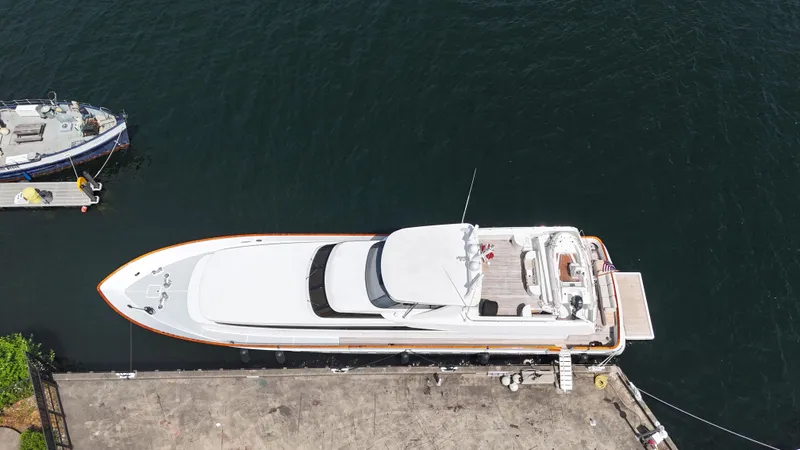 Arrivederci IV Yacht Photos Pics Aerial view of 1998 Cantieri di Pisa AKHIR yacht docked at a pier.