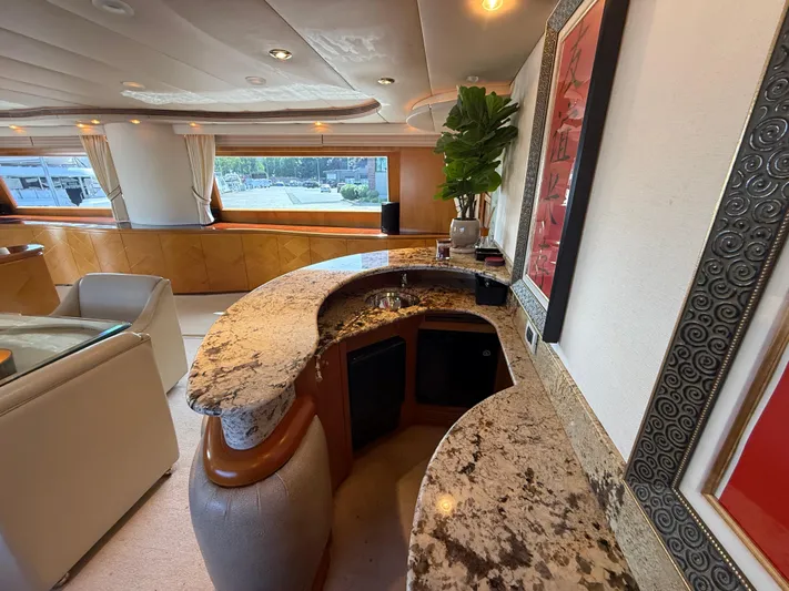 Arrivederci IV Yacht Photos Pics Luxurious 1998 Cantieri di Pisa AKHIR yacht interior with elegant granite countertops.