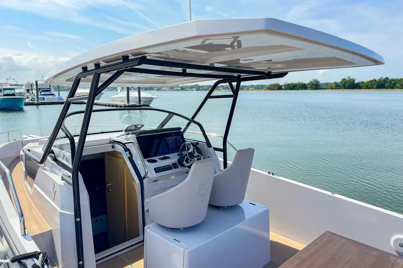 4787mm Yacht Photos Pics RYCK 280 boat interior, 2023 model, featuring modern helm and seating by the water.