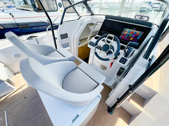 4787mm Yacht Photos Pics 2023 RYCK 280 boat cockpit with modern steering and navigation system.