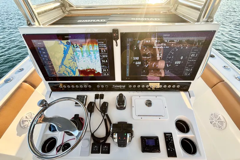  Yacht Photos Pics Helm of 2022 Tideline 365 Offshore boat with dual Simrad displays.