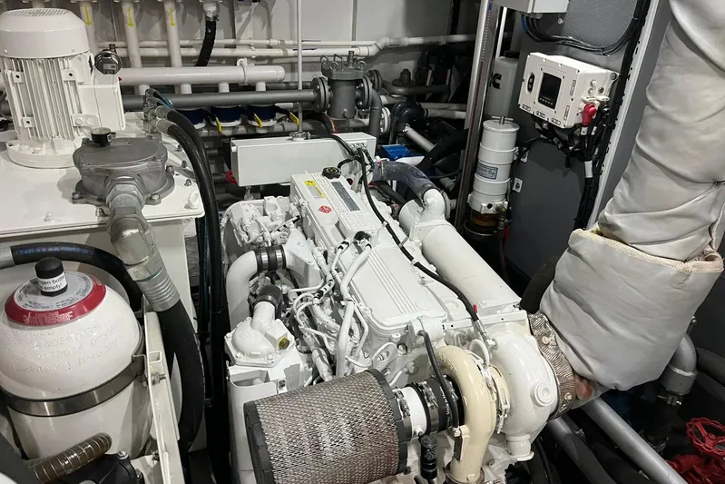  Yacht Photos Pics 2024 Explorer ICE engine room with complex machinery and piping system.