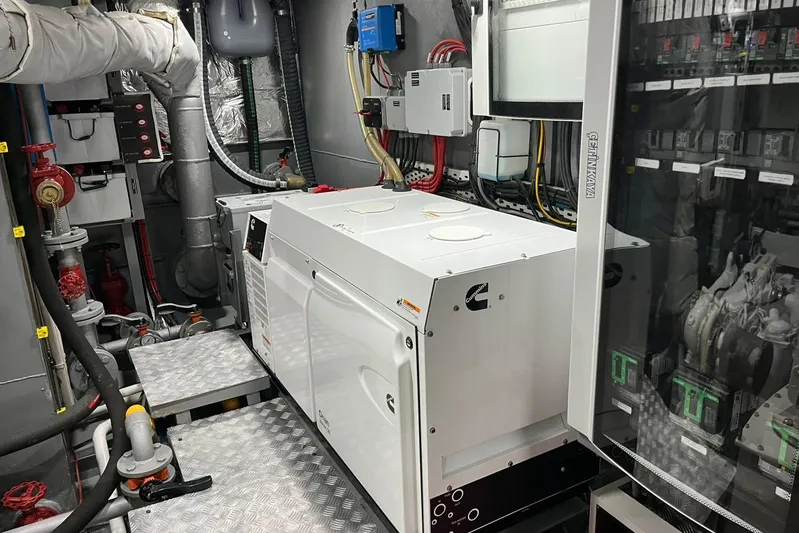  Yacht Photos Pics Engine room of 2024 Explorer ICE with Cummins generator and control systems.