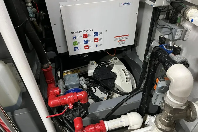 Yacht Photos Pics 2024 Explorer ICE engine room with Webasto BlueCool V-Series unit and plumbing components.