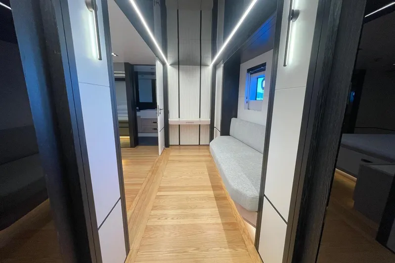  Yacht Photos Pics Modern interior of 2024 Explorer ICE, featuring sleek design and wooden flooring.