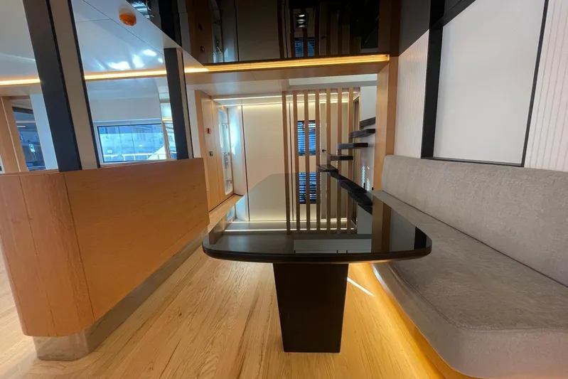  Yacht Photos Pics Modern interior of 2024 Explorer ICE, featuring sleek design and elegant wooden accents.