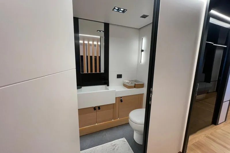  Yacht Photos Pics Modern bathroom in 2024 Explorer ICE, featuring sleek design and contemporary fixtures.