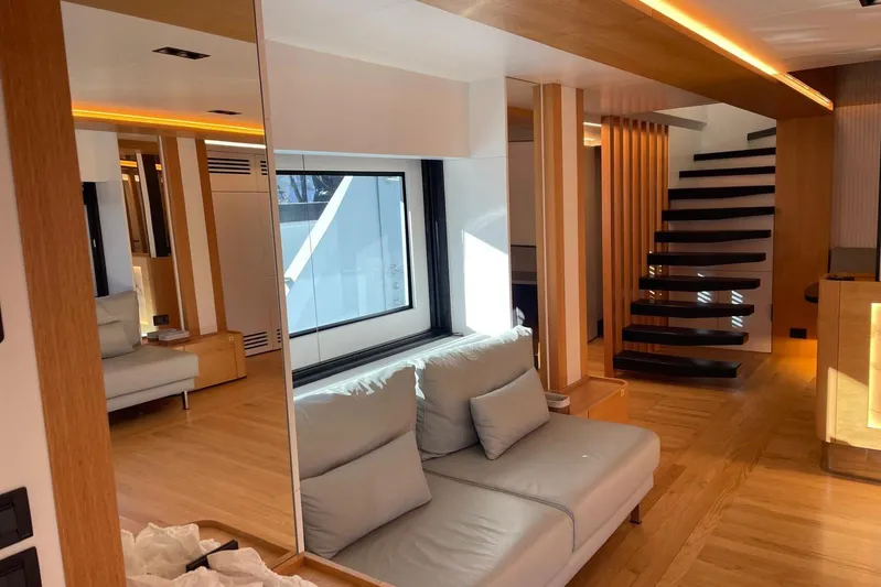  Yacht Photos Pics Modern interior of 2024 Explorer ICE yacht with sleek design, wooden accents, and stylish staircase.