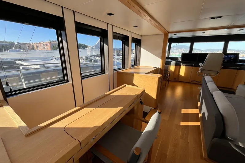  Yacht Photos Pics Luxurious interior of 2024 Explorer ICE yacht with modern furnishings and panoramic windows.