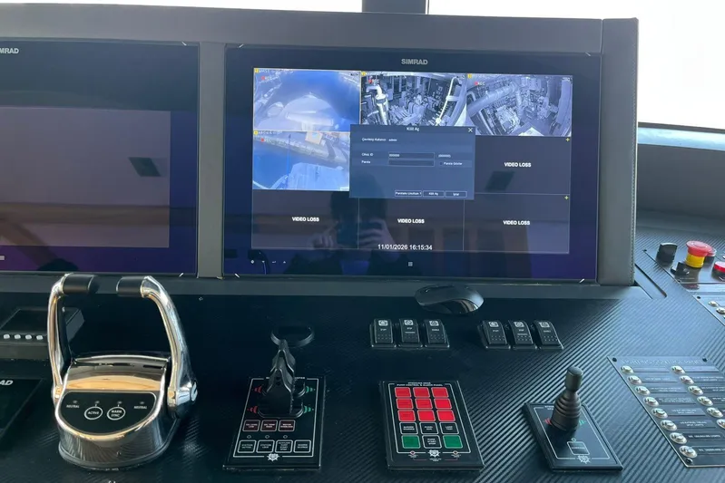  Yacht Photos Pics Control panel of 2024 Explorer ICE with multiple screens and navigation controls.