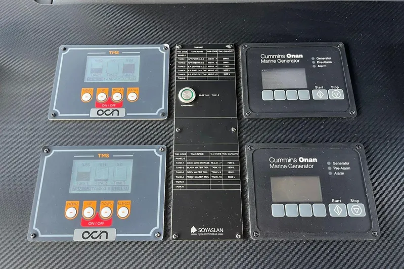  Yacht Photos Pics 2024 Explorer ICE control panel with Cummins Onan marine generator displays and TMS systems.