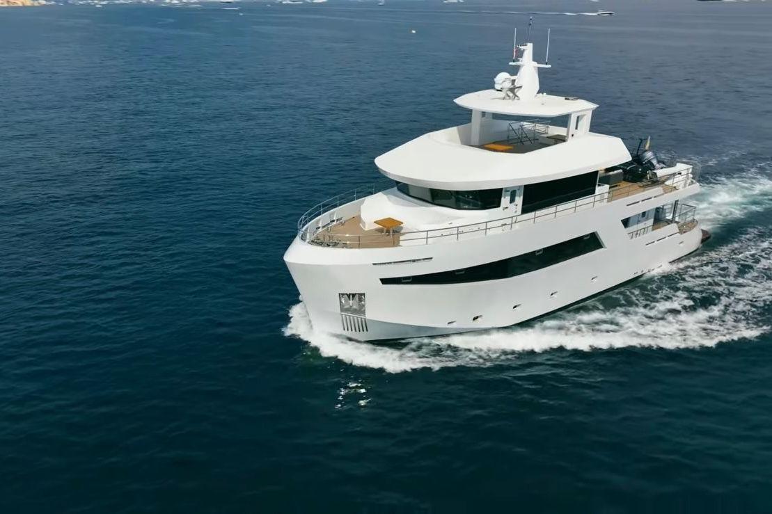 2024 Explorer ICE yacht cruising on open sea, showcasing sleek design and modern features.