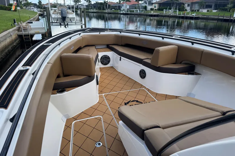  Yacht Photos Pics 2020 Fountain 38 Center Console boat interior with tan seating and sleek design.