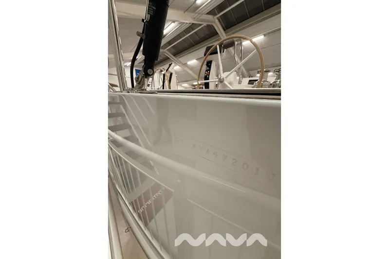  Yacht Photos Pics 2024 X-Yachts Xc 47 sailboat interior with steering wheel and sleek design.