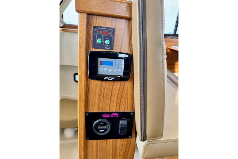  Yacht Photos Pics Control panel of 2025 Ranger Tugs R-31 CB with digital displays and switches.