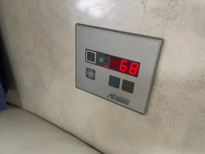  Yacht Photos Pics Digital thermostat display in a 2003 Formula 37 PC boat, showing temperature at 68 degrees.